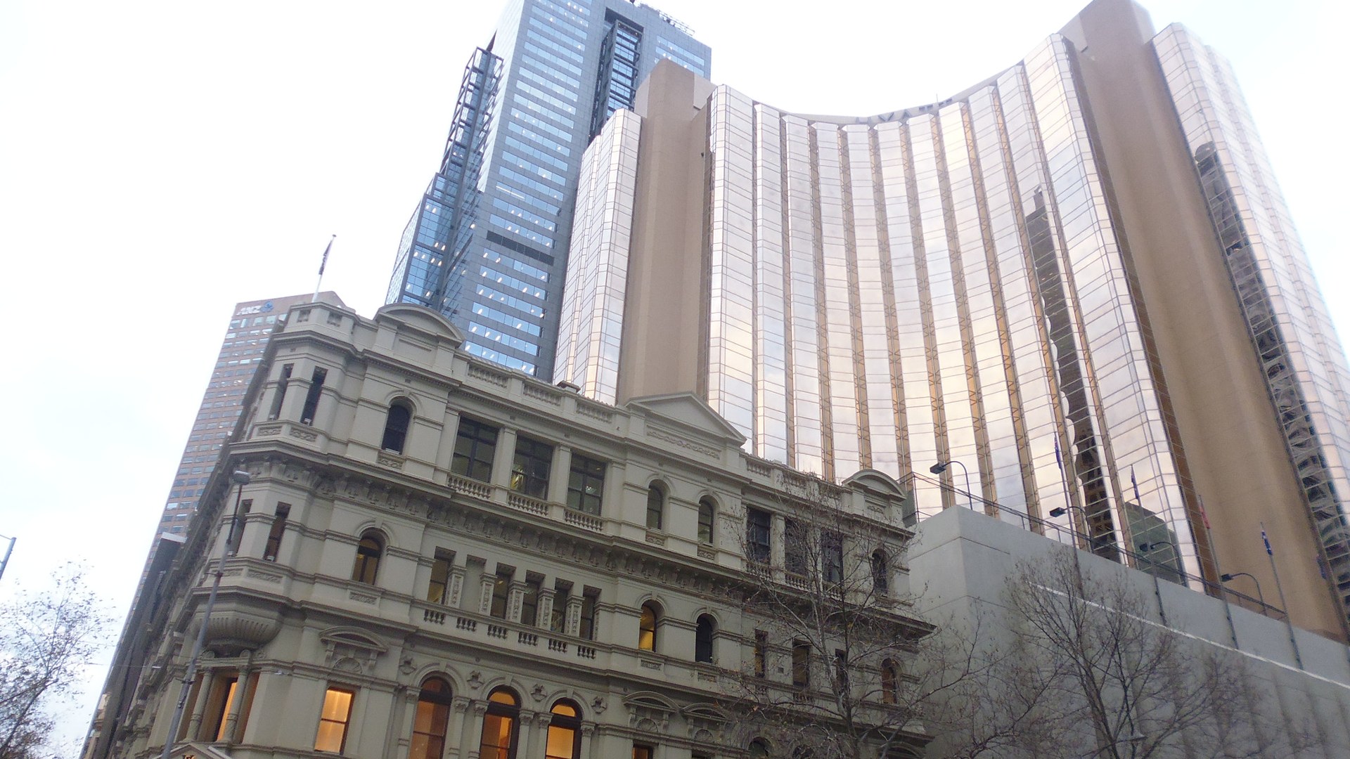 Grand Hyatt chauffeur melbourne - Chauffeur vehicle transfer outside Grand Hyatt and 101 Collins Street luxury precinct